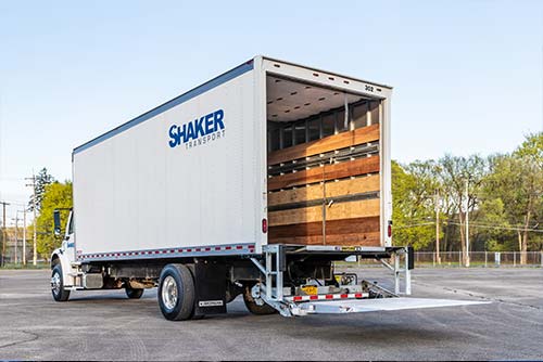 Cargo truck with open back door with lift gate