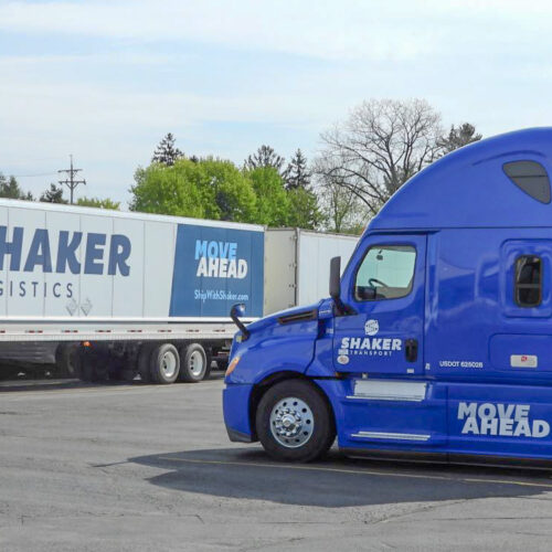 tractors and trailers in parking lot